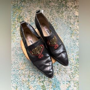 Vintage Guess woven floral black leather western booties, size 6M